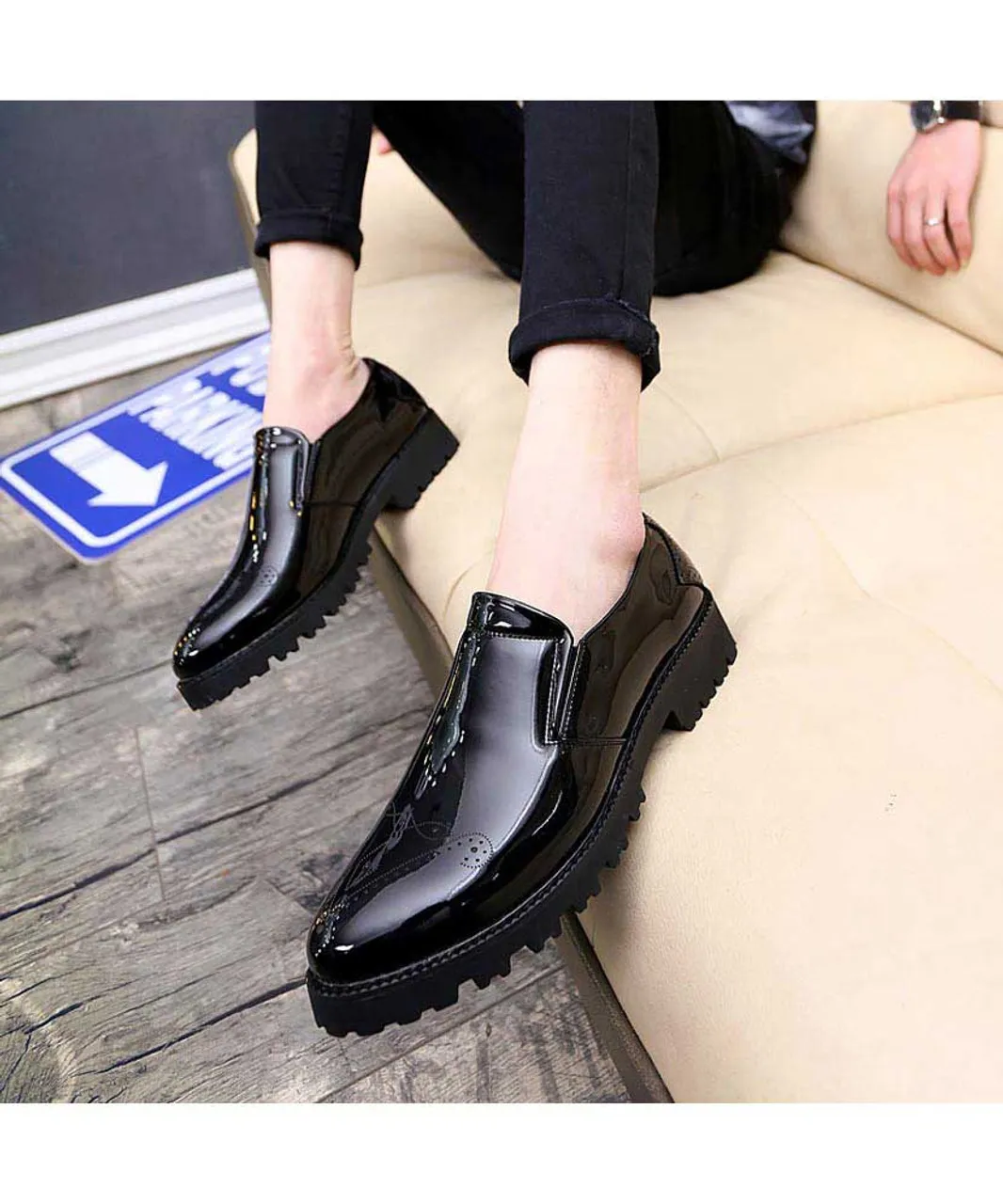 Black brogue patent leather slip on dress shoe