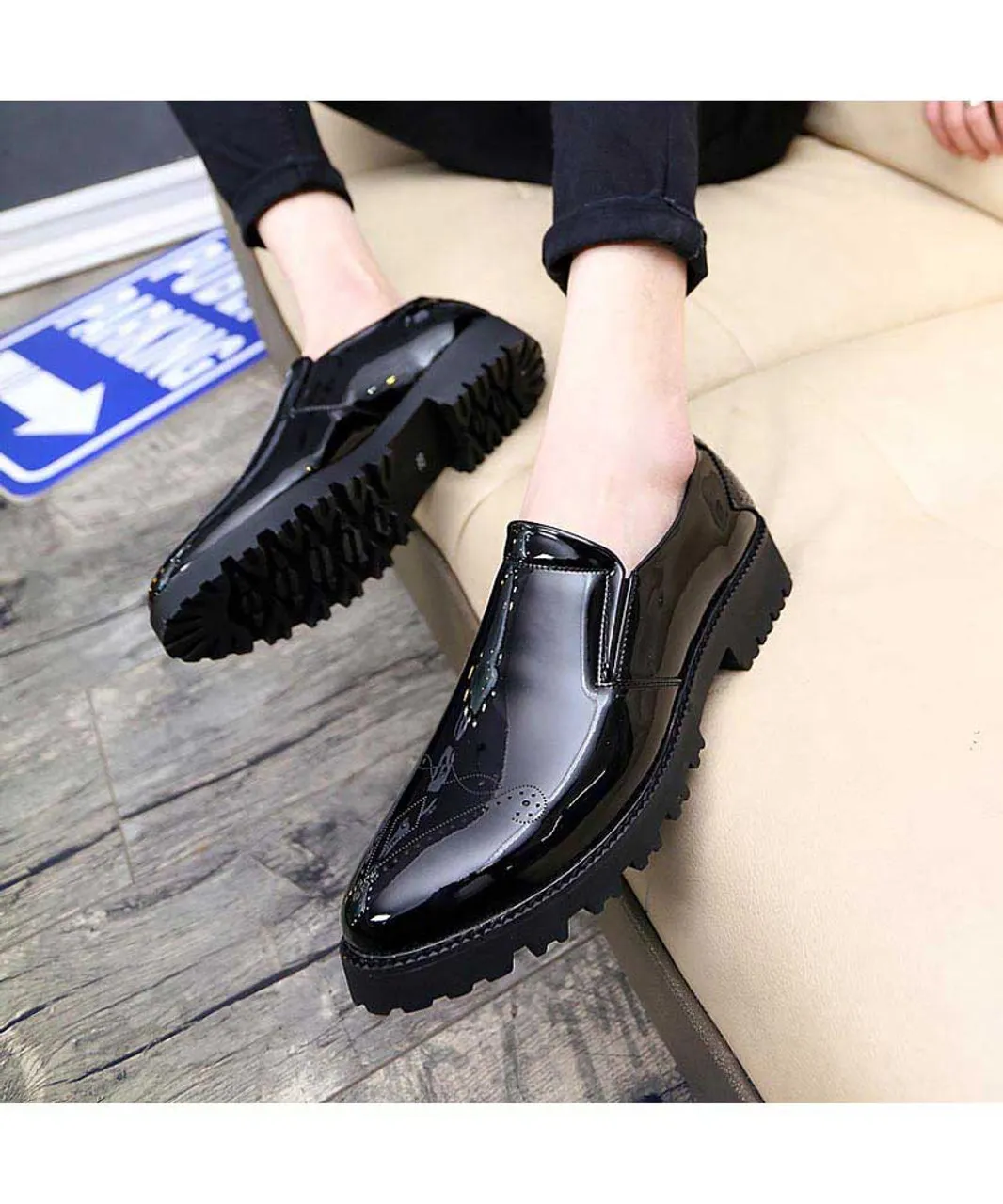 Black brogue patent leather slip on dress shoe