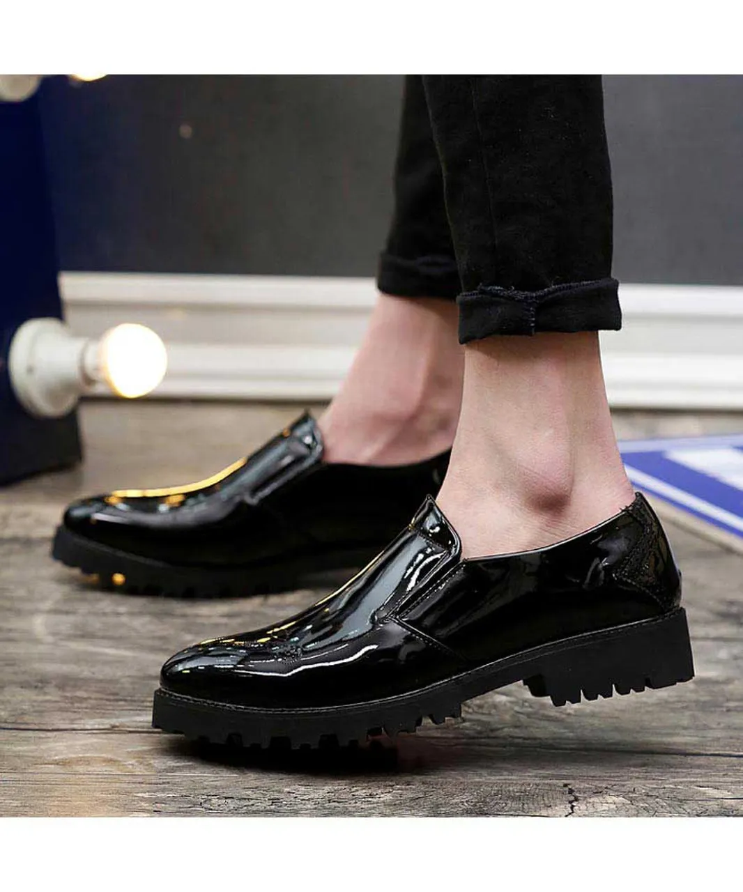 Black brogue patent leather slip on dress shoe