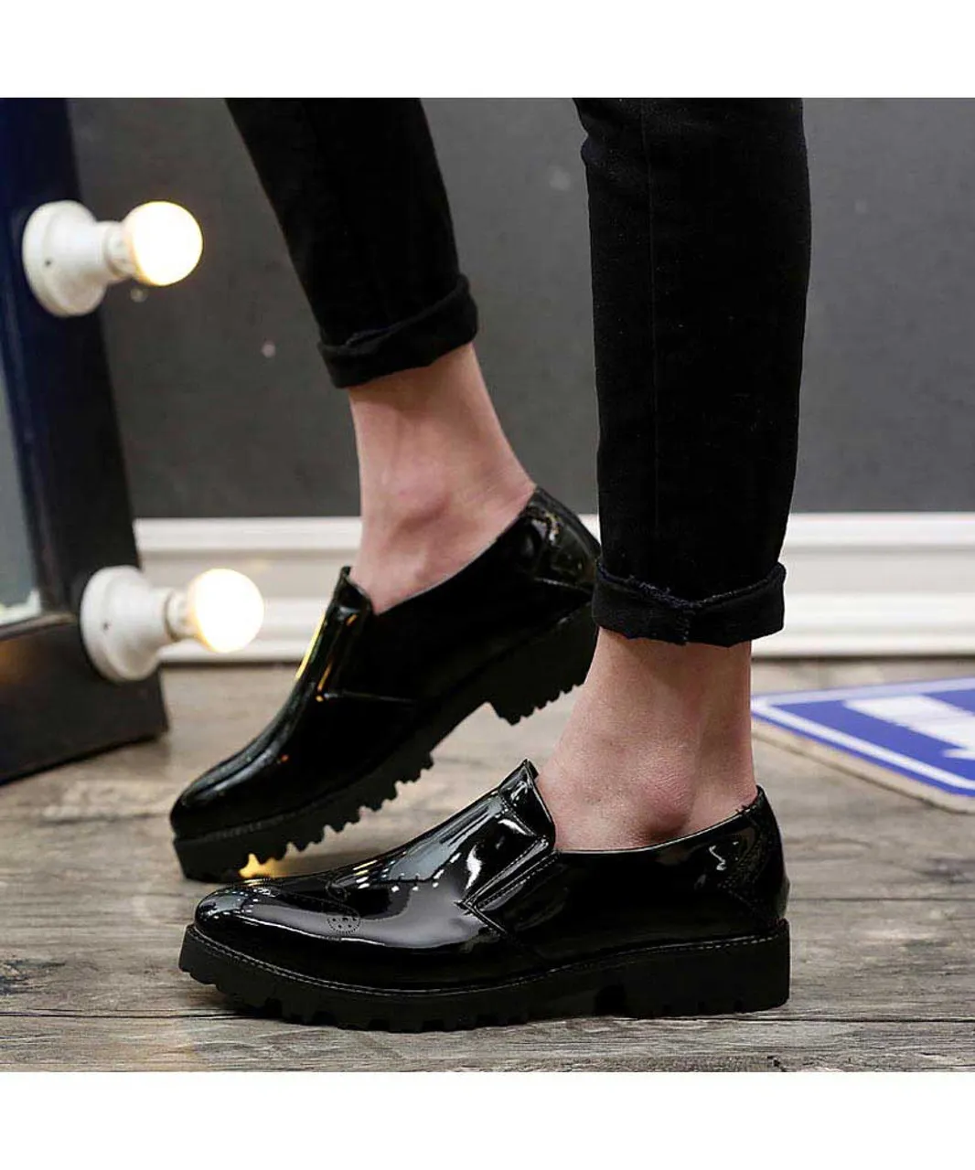 Black brogue patent leather slip on dress shoe