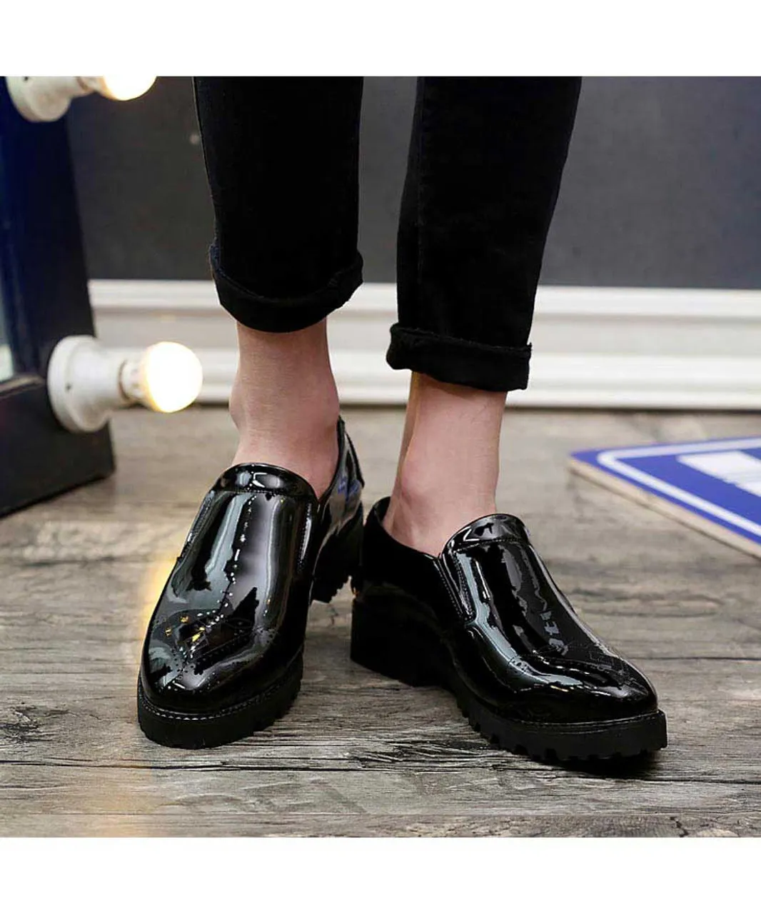 Black brogue patent leather slip on dress shoe