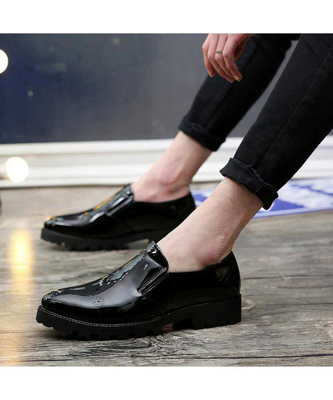 Black brogue patent leather slip on dress shoe