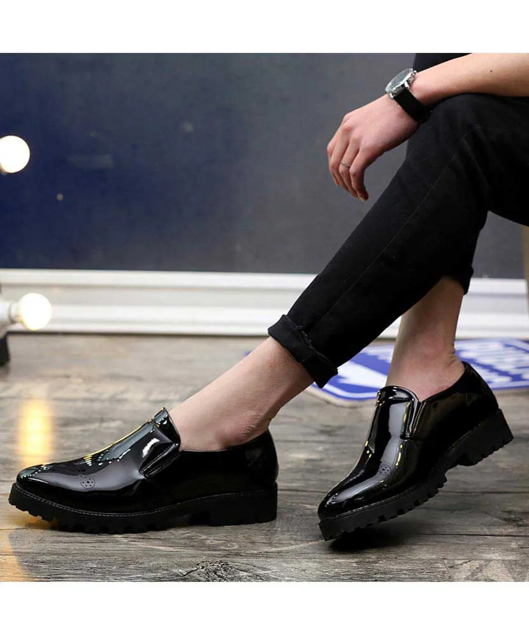 Black brogue patent leather slip on dress shoe