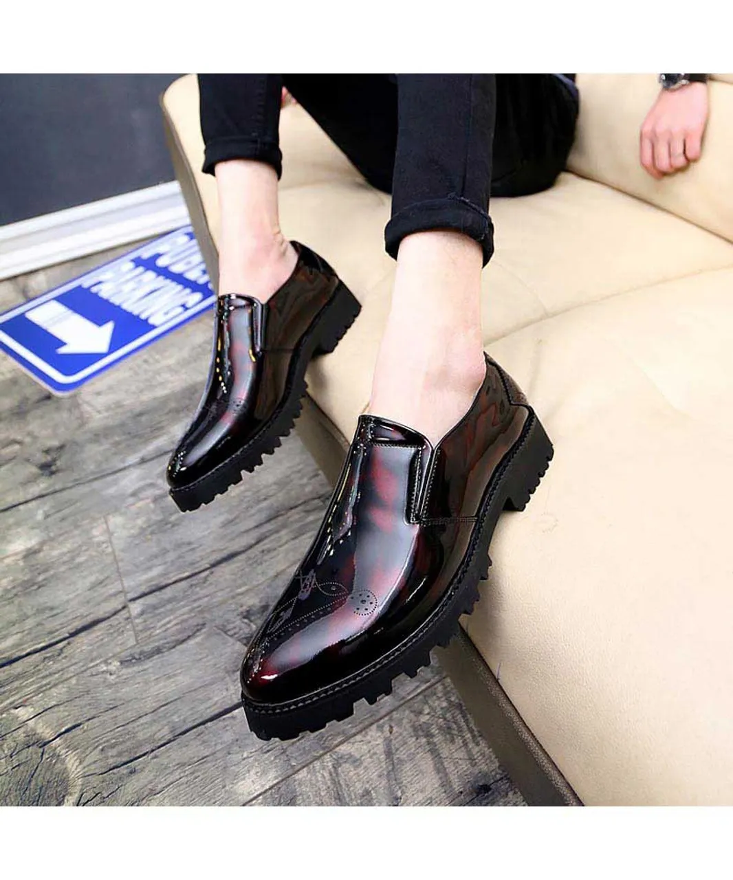 Red brogue patent leather slip on dress shoe