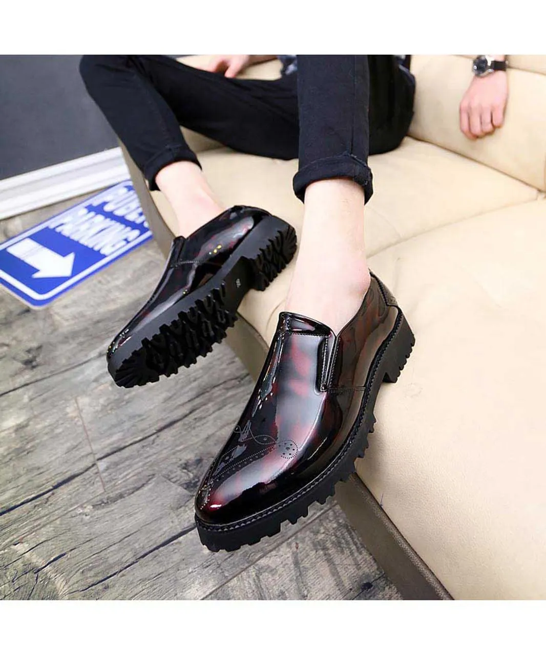 Red brogue patent leather slip on dress shoe