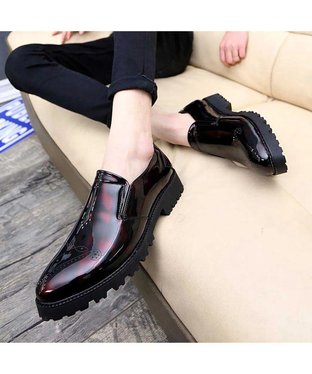 Red brogue patent leather slip on dress shoe